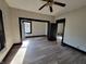 Spacious living room with hardwood floors and lots of sunlight at 2826 Station St, Indianapolis, IN 46218