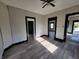 Living room with hardwood floors and ceiling fan at 2826 Station St, Indianapolis, IN 46218