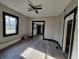 Open living room with hardwood floors and multiple doorways at 2826 Station St, Indianapolis, IN 46218