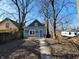 House in backyard with walkway; needs landscaping at 2955 N Olney St, Indianapolis, IN 46218
