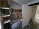 Bathroom with new tub and shelving; undergoing renovation at 2955 N Olney St, Indianapolis, IN 46218