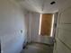 Small bathroom with new flooring, ready for renovation at 2955 N Olney St, Indianapolis, IN 46218
