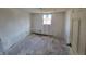 Unfinished bedroom with hardwood floors and window at 2955 N Olney St, Indianapolis, IN 46218