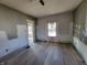 Under renovation bedroom with new flooring and fresh paint at 2955 N Olney St, Indianapolis, IN 46218