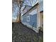 Side of house with new siding; needs landscaping at 2955 N Olney St, Indianapolis, IN 46218