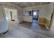 Under renovation kitchen space with new flooring, ready for updates at 2955 N Olney St, Indianapolis, IN 46218