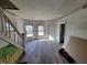 Spacious living room with large windows, under renovation at 2955 N Olney St, Indianapolis, IN 46218