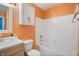 Bathroom with a tub, shower, and updated vanity at 3830 Pineview Ln, Greenwood, IN 46142
