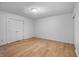 Spacious bedroom with wood floors and neutral walls at 3830 Pineview Ln, Greenwood, IN 46142