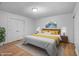 Bright bedroom with wood floors and double doors at 3830 Pineview Ln, Greenwood, IN 46142