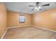 Simple bedroom with hardwood floors and light orange walls at 3830 Pineview Ln, Greenwood, IN 46142