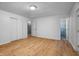 Bedroom with wood floors and access to bathroom at 3830 Pineview Ln, Greenwood, IN 46142