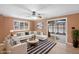 Gathering room with hardwood floors, sliding doors to patio at 3830 Pineview Ln, Greenwood, IN 46142