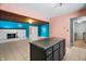 Kitchen with dark wood cabinets and an island at 3830 Pineview Ln, Greenwood, IN 46142