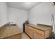 Laundry room with granite countertops and cabinets at 3830 Pineview Ln, Greenwood, IN 46142