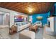 Open floor plan with modern living room connected to a kitchen area, unique ceiling at 3830 Pineview Ln, Greenwood, IN 46142