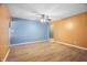 Spacious living room with hardwood floors and two-tone walls at 3830 Pineview Ln, Greenwood, IN 46142