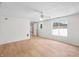 Living room with hardwood floors and a view to backyard at 3830 Pineview Ln, Greenwood, IN 46142