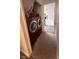 Red LG washer and dryer in closet laundry room with linoleum floor and kitchen view at 4059 Eagle Cove W W Dr, Indianapolis, IN 46254