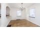 Dining room with hardwood floors and chandelier at 5530 N Illinois St, Indianapolis, IN 46208