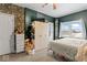 Bright bedroom with a double bed and built-in closet at 635 E 10Th St, Indianapolis, IN 46202