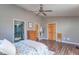 Spacious bedroom with hardwood floors, double doors and ensuite bathroom at 6800 Beech Grove Rd, Martinsville, IN 46151