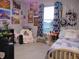 Charming bedroom with window, and abundant wall decor at 7099 S 1100 W, Jamestown, IN 46147