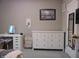 Well-lit bedroom featuring a vanity and dresser at 7099 S 1100 W, Jamestown, IN 46147