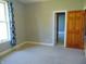 Neutral bedroom with carpet, window, and wood trim at 7099 S 1100 W, Jamestown, IN 46147