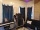 Inviting exercise room featuring a treadmill, piano, and comfortable seating at 7099 S 1100 W, Jamestown, IN 46147
