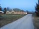 House exterior with gravel driveway at 7099 S 1100 W, Jamestown, IN 46147