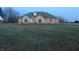 Stone and brick house with a grassy yard at 7099 S 1100 W, Jamestown, IN 46147