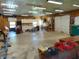 The interior of the shop building has a large garage and tons of lighting at 7099 S 1100 W, Jamestown, IN 46147