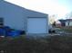 Detached garage with a white overhead door at 7099 S 1100 W, Jamestown, IN 46147
