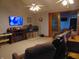 Living room with fireplace and sliding glass doors at 7099 S 1100 W, Jamestown, IN 46147