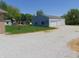 Large outbuilding with white garage doors offers ample storage and workspace at 7099 S 1100 W, Jamestown, IN 46147