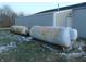 Two rusty propane tanks sit on the ground at 7099 S 1100 W, Jamestown, IN 46147