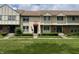Charming townhomes with well-maintained lawns and unique architectural details for inviting curb appeal at 8021 E 20Th St, Indianapolis, IN 46219