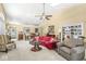 Spacious living room with vaulted ceiling, comfy seating, and built-in shelving at 8139 River Bay E Dr, Indianapolis, IN 46240