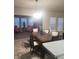 Dining room with a large table and view of living room at 9149 Thames Dr, Avon, IN 46123