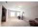 Large bonus room with an office space, neutral walls, and carpet at 10406 Corning Way, Fishers, IN 46038
