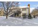 House exterior showcasing a screened porch and snowy backyard at 10896 Camden Ct, Fishers, IN 46038