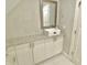 White vanity with granite countertop and rectangular sink at 114 N Oriental St, Indianapolis, IN 46202