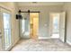 Bedroom featuring a barn door closet and a balcony at 114 N Oriental St, Indianapolis, IN 46202
