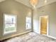 Spacious bedroom with carpeting and two windows at 114 N Oriental St, Indianapolis, IN 46202
