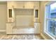 Custom built-in storage with bench seating and cabinets at 114 N Oriental St, Indianapolis, IN 46202