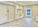 Modern entryway with built-in bench seating and storage at 114 N Oriental St, Indianapolis, IN 46202