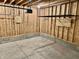 Unfinished garage with overhead storage at 114 N Oriental St, Indianapolis, IN 46202