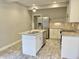 Kitchen island with granite countertop and double sink at 114 N Oriental St, Indianapolis, IN 46202
