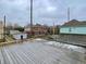 Spacious rooftop deck with city views and black railing at 114 N Oriental St, Indianapolis, IN 46202